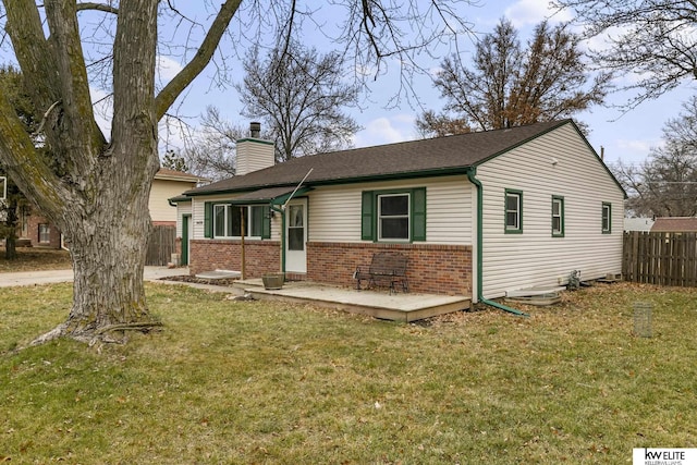 single story home with a front lawn, fence, roof with shingles, brick siding, and a chimney