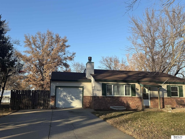 ranch-style house with brick siding, fence, a chimney, driveway, and an attached garage