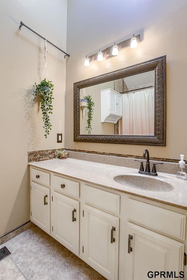 full bath with visible vents and vanity