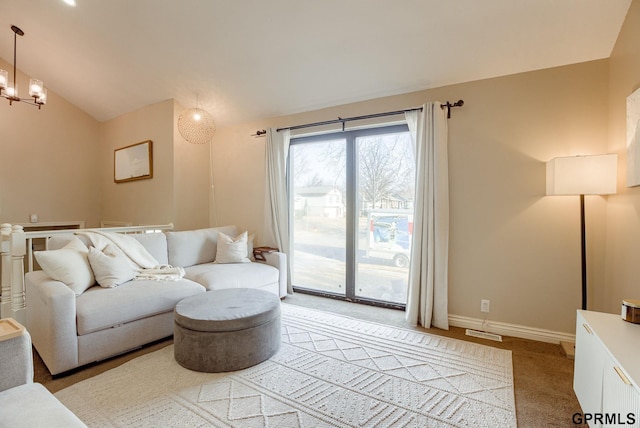 living room featuring visible vents, baseboards, vaulted ceiling, light colored carpet, and a chandelier