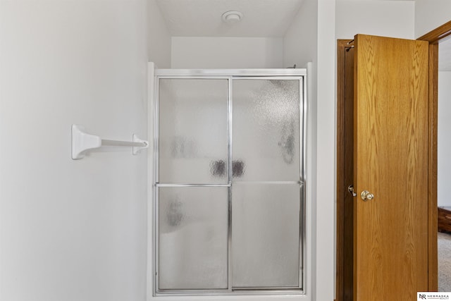 bathroom featuring a stall shower