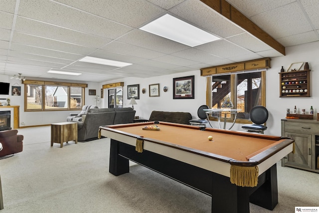 recreation room featuring billiards, carpet flooring, a healthy amount of sunlight, and a paneled ceiling