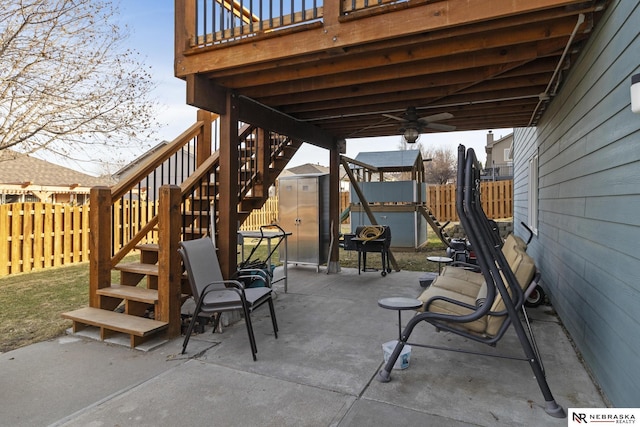 view of patio / terrace with stairs and a fenced backyard