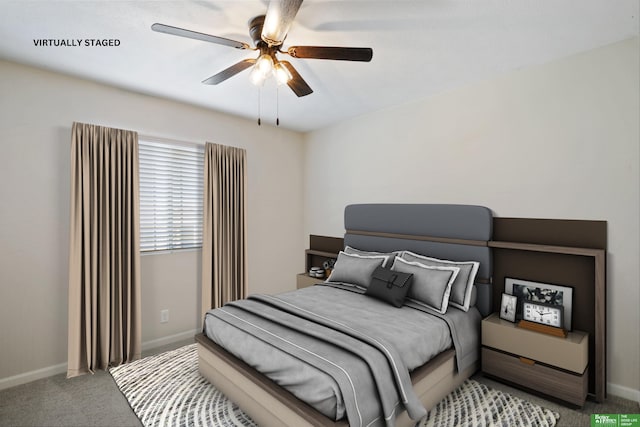 bedroom featuring baseboards, carpet, and ceiling fan