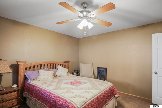 bedroom with baseboards, carpet, and a ceiling fan