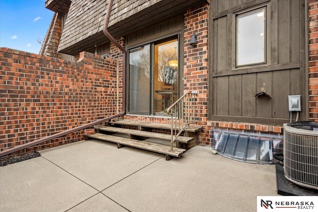 view of patio / terrace featuring entry steps and cooling unit