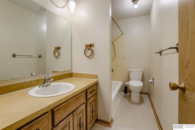 bathroom featuring toilet, a textured ceiling, tile patterned flooring, tub / shower combination, and vanity