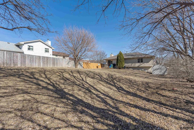 view of yard with fence