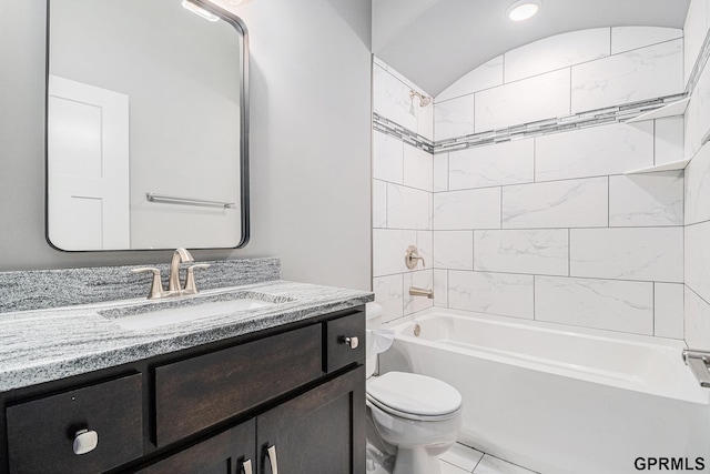 full bathroom featuring bathing tub / shower combination, toilet, and vanity