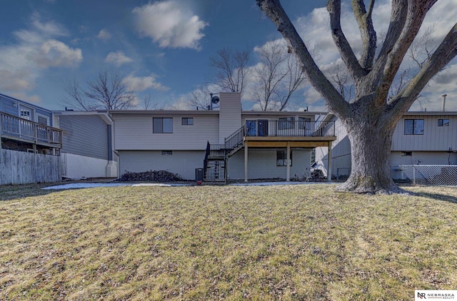 10230 Weir St, Ralston, NE 68127 - back of house featuring stairway, central AC unit, fence, a deck, and a lawn