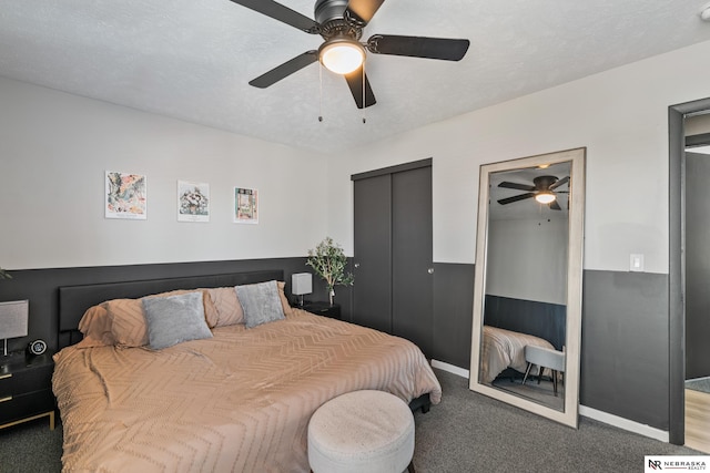 10230 Weir St, Ralston, NE 68127 - bedroom with baseboards, a textured ceiling, a ceiling fan, and carpet floors
