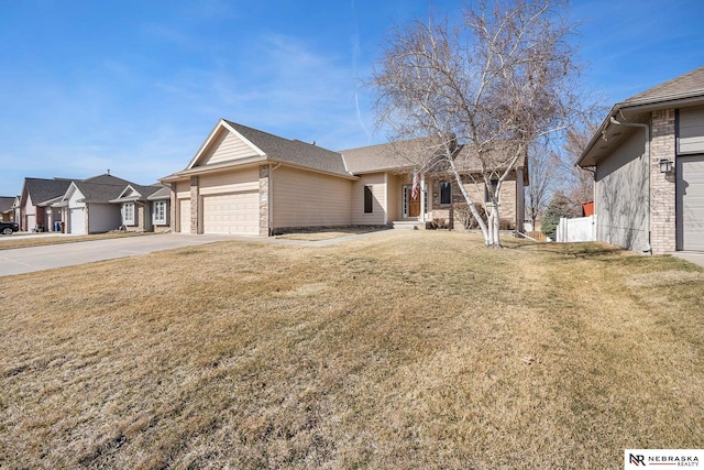 single story home with a front yard, driveway, brick siding, a garage, and a residential view