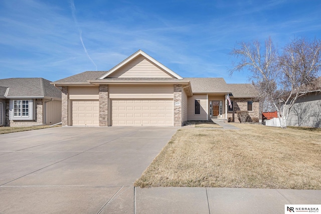 single story home with a garage, concrete driveway, a front yard, and a shingled roof