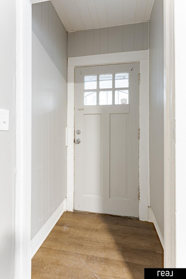 doorway with light wood finished floors