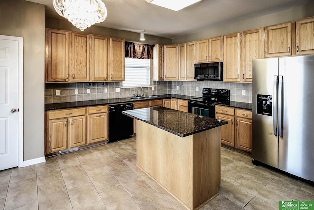 kitchen with decorative backsplash, black appliances, an inviting chandelier, and a sink