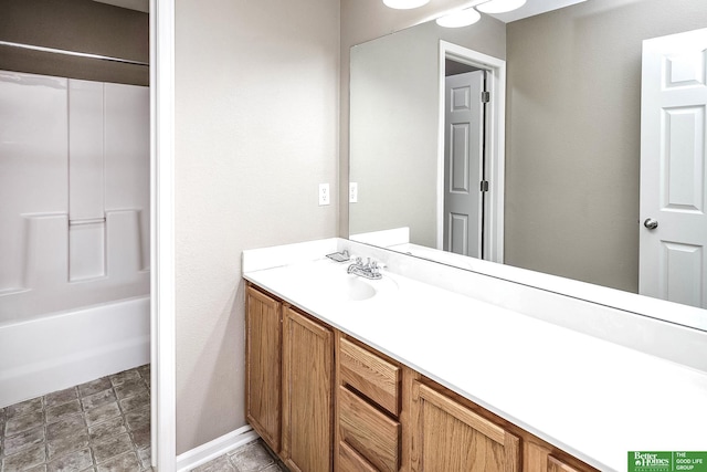 full bathroom with vanity and washtub / shower combination