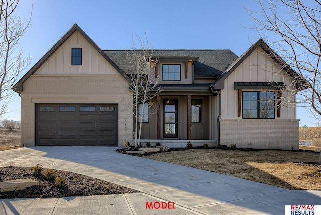 modern farmhouse featuring board and batten siding, concrete driveway, a garage, and brick siding