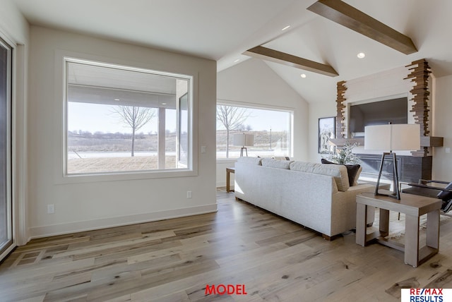 living room featuring beam ceiling, recessed lighting, light wood-style flooring, and baseboards