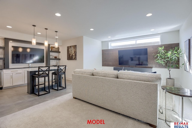 living area featuring recessed lighting