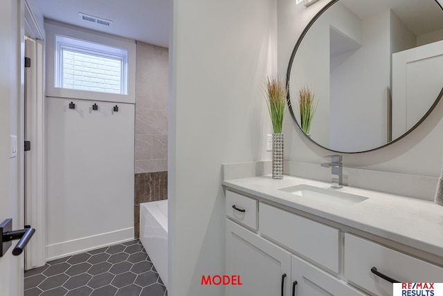 full bath featuring visible vents and vanity