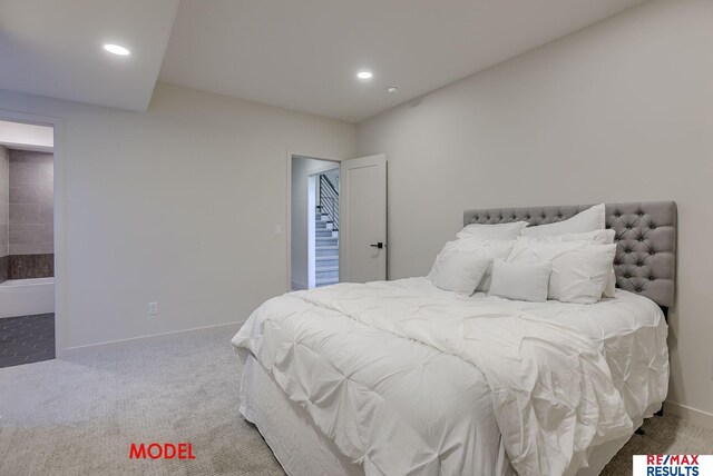 carpeted bedroom with recessed lighting and baseboards