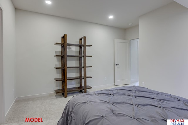 unfurnished bedroom with recessed lighting, baseboards, and carpet floors