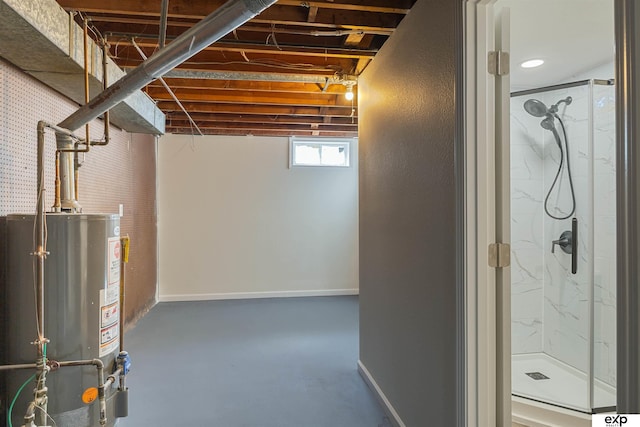 basement with gas water heater and baseboards