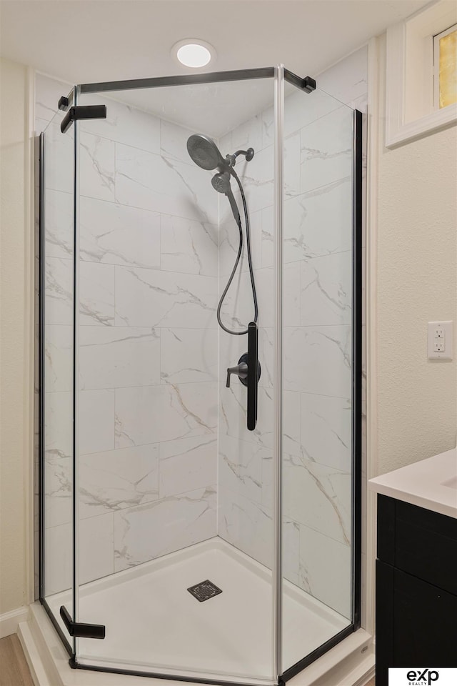 bathroom featuring a stall shower