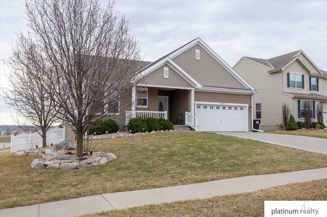 view of front of home with a front yard, an attached garage, covered porch, fence, and concrete driveway