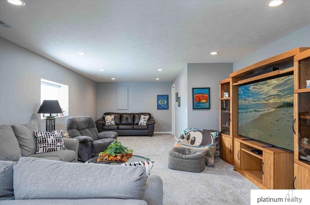 living area with carpet flooring and recessed lighting