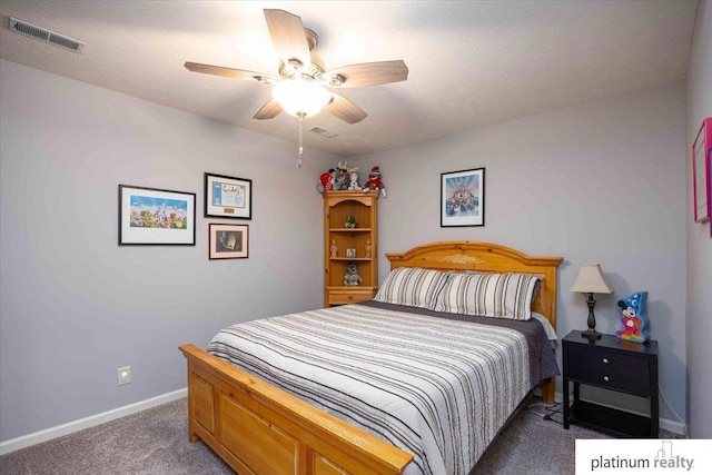 bedroom with ceiling fan, carpet flooring, baseboards, and visible vents