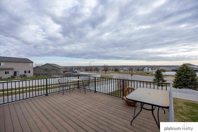 wooden deck featuring fence