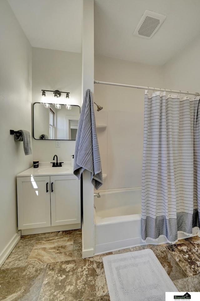 bathroom with vanity, shower / bath combination with curtain, baseboards, and visible vents