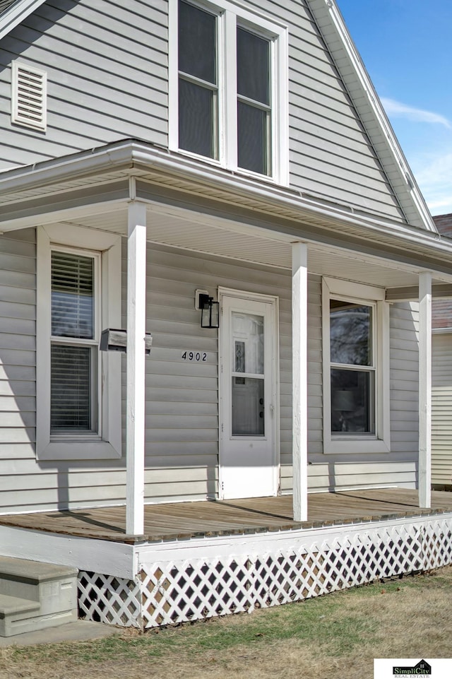 entrance to property with a porch