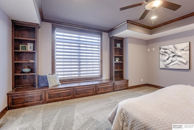 bedroom with ornamental molding, baseboards, and light carpet