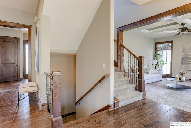 foyer entrance with ceiling fan, baseboards, and dark wood-style floors