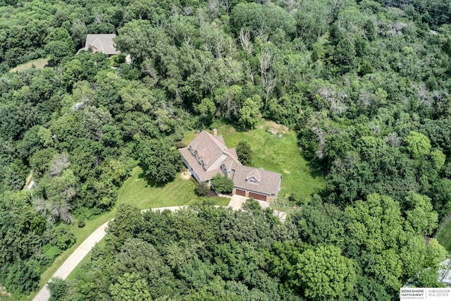 aerial view featuring a forest view