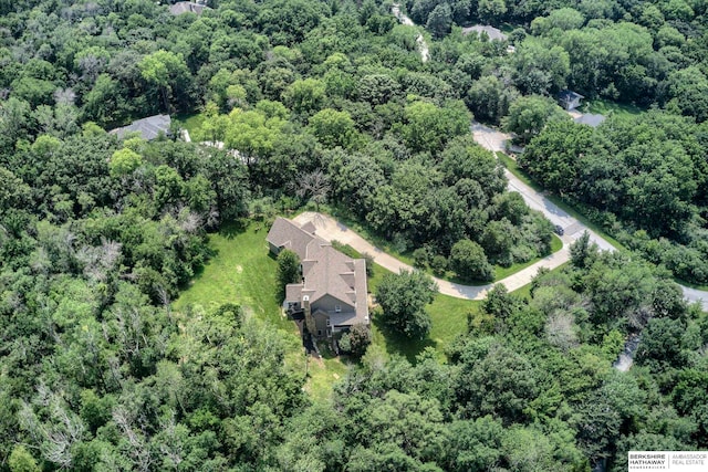 drone / aerial view with a forest view