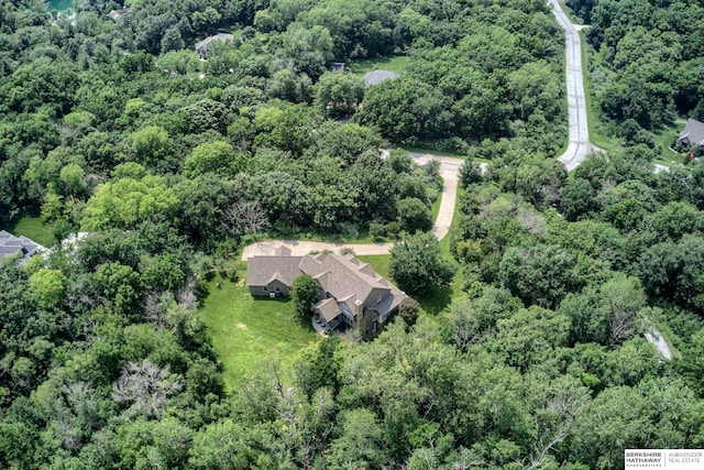 bird's eye view with a forest view