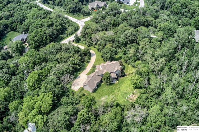 drone / aerial view with a forest view