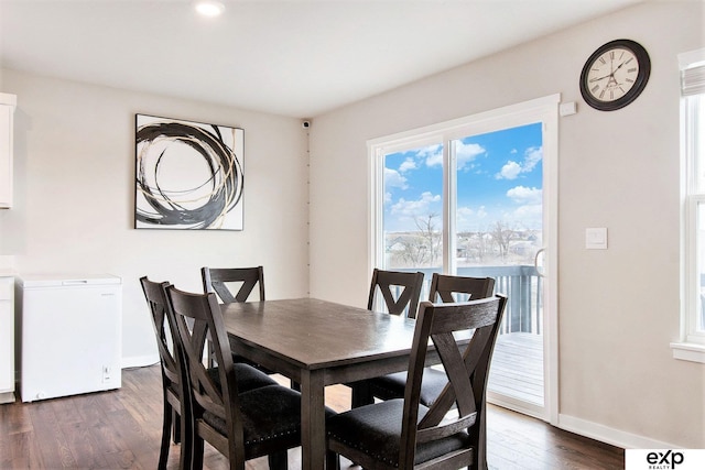 dining space featuring baseboards, dark wood-style floors, and recessed lighting