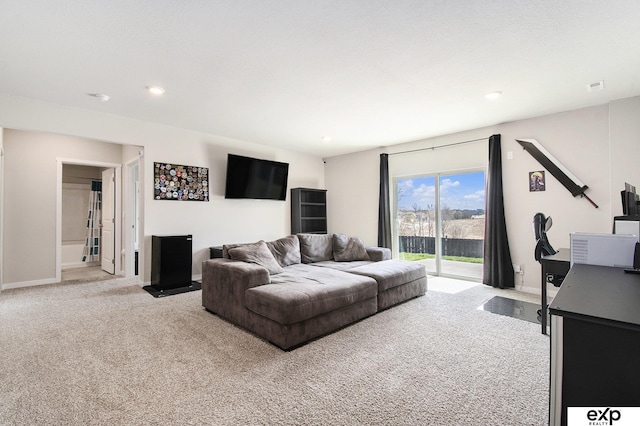 living area with light carpet, baseboards, visible vents, and recessed lighting