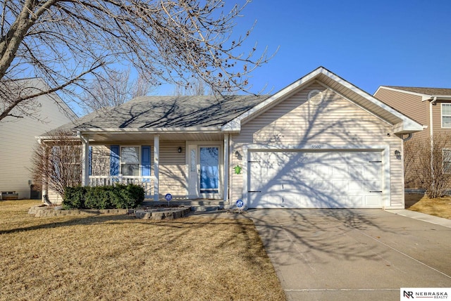 ranch-style home with a garage, a front yard, a porch, and driveway