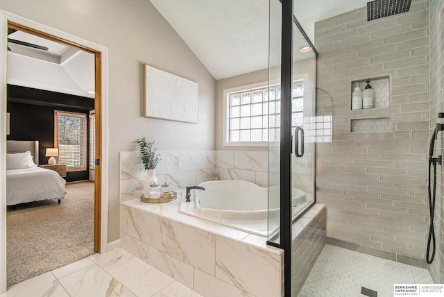 bathroom featuring ensuite bath, lofted ceiling, a tile shower, a bath, and marble finish floor