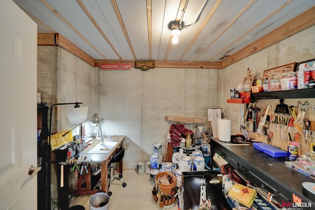 basement with a workshop area