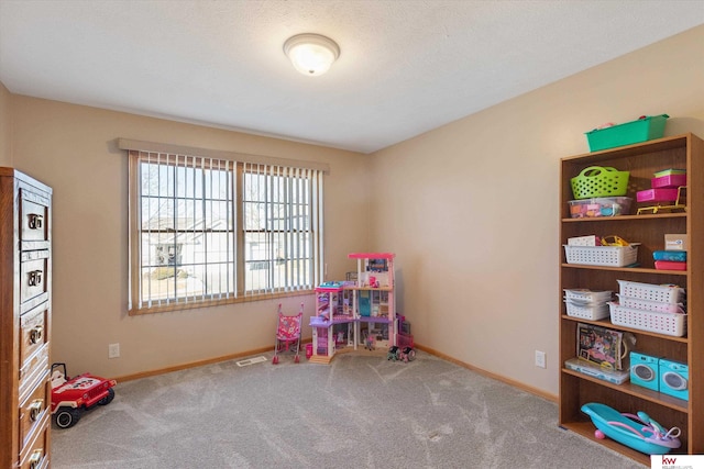 game room with visible vents, baseboards, and carpet