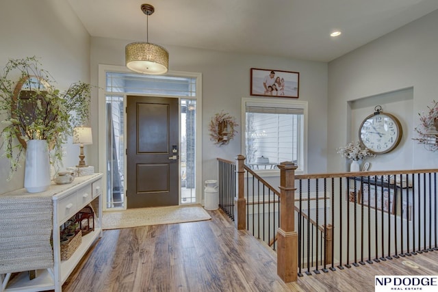 entrance foyer with recessed lighting and wood finished floors