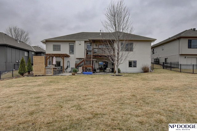 rear view of property featuring a patio area, a lawn, a fenced backyard, and a pergola