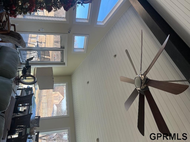 interior details featuring ceiling fan