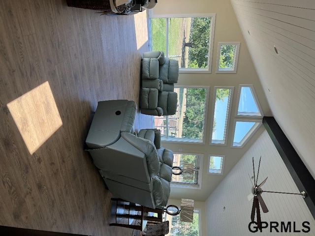 living room with a towering ceiling